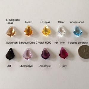 May include: Assortment of Swarovski Baroque Drop Crystals in various colors, including Lt Colorado Topaz, Topaz, Lt Topaz, Clear, Aquamarine, Jet, Lt Amethyst, Amethyst, and Ruby. Each crystal measures 16x11mm and comes in a pack of 4.