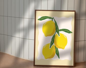 May include: A framed art print featuring a cluster of three bright yellow lemons with green leaves. The lemons are set against a cream-colored background with a soft, wavy border, all within a brown wooden frame. The artwork has a minimalist, illustrative style.