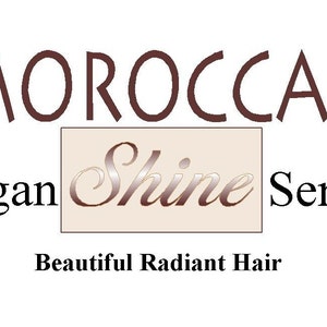 May include: White background with the words "MOROCCAN Argan Shine Serum" in brown and beige lettering. The text "Beautiful Radiant Hair" is at the bottom. The word "Shine" is in a beige box.