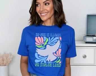 No One Is Illegal On Stolen Land, Political Activist Tee, Protest Shirt, Social Justice Clothing, Colorful Bird & Flower Design