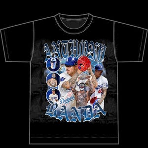 May include: Black t-shirt with a graphic print of baseball players and the text "Anthony Banda" in a stylized font.