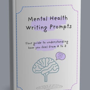 May include: A book titled "Mental Health Writing Prompts" with a light gray cover. The cover features the title in black and a purple banner. Below the title is the text "Your guide to understanding how you feel from A to Z". An illustration of a brain is also on the cover.