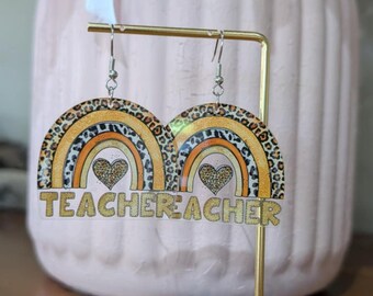 Regenboogoorbellen leraar