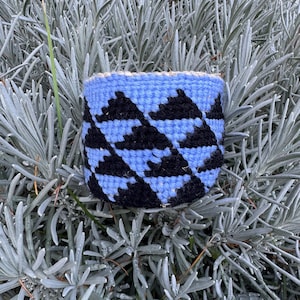 Tiny handwoven basket made of hemp cord and acrylic yarn. Native American made.