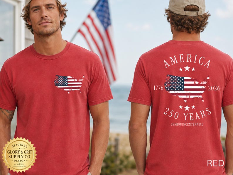 May include: Red t-shirts with an American flag design. One shirt has a small flag map on the chest. The other shirt has a larger flag map with the words "AMERICA", "1776", "2026", and "250 YEARS".