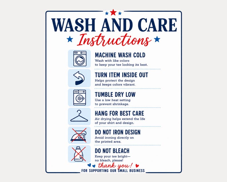 May include: A white rectangular sign with a blue border displays wash and care instructions for a tee. The text includes "Machine Wash Cold", "Turn Item Inside Out", "Tumble Dry Low", "Hang for Best Care", "Do Not Iron Design", and "Do Not Bleach".