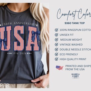 May include: A dark gray tank top with the word "USA" in red and white stripes, accented with blue bows. The text "250TH ANNIVERSARY" and "1776-2026" are above and below the word "USA". The tank top is part of the Comfort Colors collection.