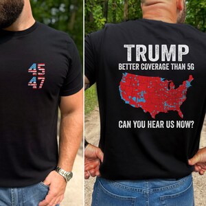 May include: Black t-shirt with a red, white, and blue American flag design with the numbers 45 and 47. The back of the shirt has a map of the United States with red and blue markings and the text "TRUMP BETTER COVERAGE THAN 5G CAN YOU HEAR US NOW?"