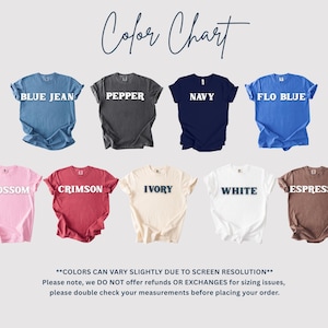 May include: A color chart displaying nine t-shirts in various colors, including blue jean, pepper, navy, and flo blue. The text "Color Chart" is at the top. The shirts are labeled with their respective colors in white text.