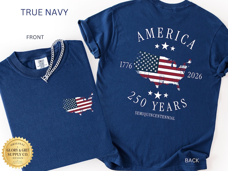 May include: Two navy blue t-shirts. One shows the front with a small American flag graphic on the pocket. The other shows the back with a large American flag graphic in the shape of the USA, with the text "AMERICA 250 YEARS".