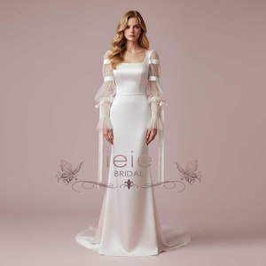 Inspired by Erin Foster&#39;s Minimalist Simple Satin Wedding Dress with a Statement Sleeve | PAOLA