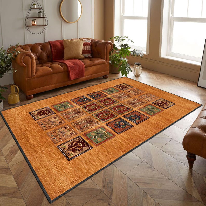 May include: A brown and beige area rug with a geometric pattern of squares. Each square features a different design in shades of blue, green, red, and brown.