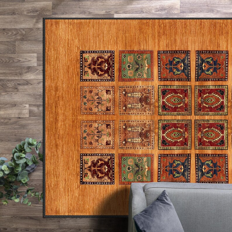 May include: A brown area rug with a repeating pattern of colorful squares. The squares feature intricate floral and geometric designs in shades of red, blue, green, and gold.