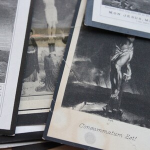 May include: A black and white photo of a religious scene with the text "Consummatum Est!" printed below the image.