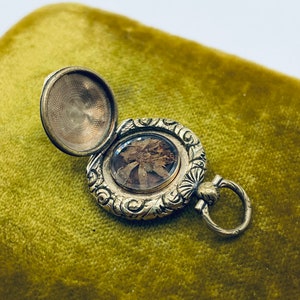 Tiny Victorian Deeply Carved Gold Pocket Watch Locket circa 1850 with Tiny Pressed Flowers Under Glass/ Antique Gold Memorial Locket