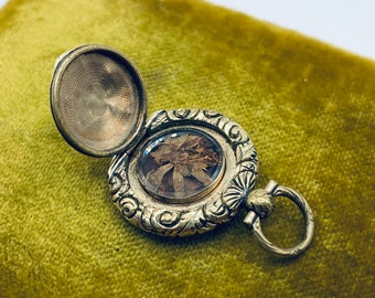 Tiny Victorian Deeply Carved Gold Pocket Watch Locket circa 1850 with Tiny Pressed Flowers Under Glass/ Antique Gold Memorial Locket