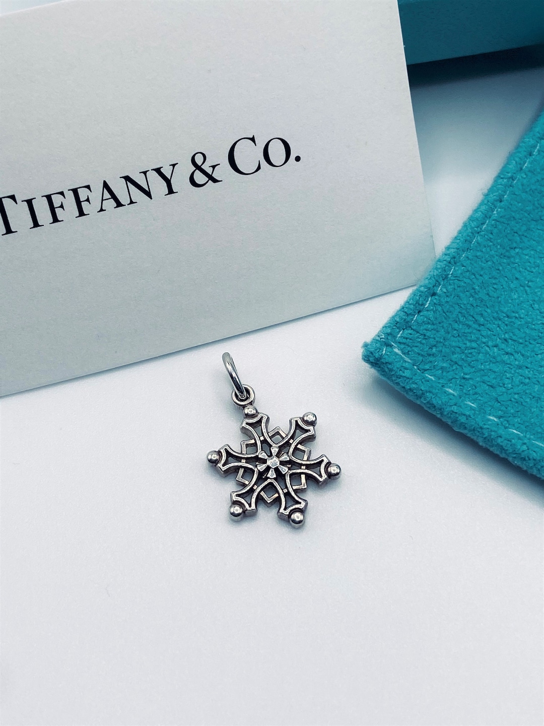Retired Vintage Tiffany & Co. Sterling Snowflake Charm Pendant
