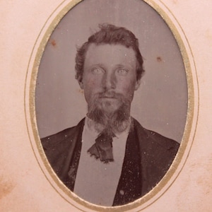 Antique Victorian Tintype Photograph of a Handsome Bearded Man with Blue Eyes in Decorative Paper Frame