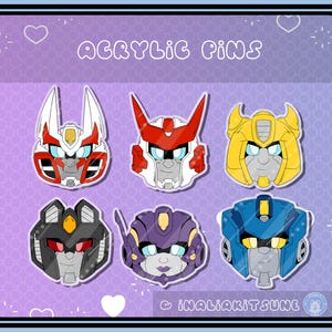 Puede incluir: Seis pines de acrílico de colores con cabezas de robots de dibujos animados. Los pines son de varios colores, incluyendo rojo, blanco, azul, amarillo, negro y morado. El texto "ACRYLIC PINS" está en la parte superior de la imagen. El texto "INALIAKITSUKE" está en la parte inferior de la imagen.