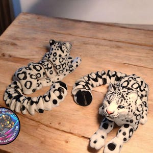 3D Printed Snow Leopard Figurine: Articulated Desk Pet