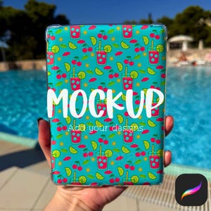 May include: A teal tablet case with a repeating pattern of red cocktails, cherries, and lime slices. The word "MOCKUP" is printed in large white letters across the center, with "Add your designs" below.
