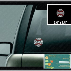 May include: A white baseball with red stitching, made of rhinestones, is shown on a car window. The baseball is 2.4 inches by 2.4 inches.
