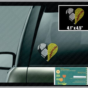 May include: A rhinestone design of a heart made of a softball and a baseball. The heart is yellow, white, and maroon. The design is 4.1 inches by 4.5 inches.