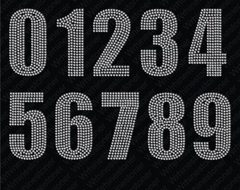May include: A collection of rhinestone numbers from 0 to 9, each approximately 5.08 cm wide and 9.93 cm tall, set against a black backdrop. The numbers are composed of tiny, glittering rhinestones.