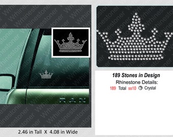 May include: A silver rhinestone crown design with 189 stones. The crown is 2.46 inches tall and 4.08 inches wide. The design is shown on a car window.