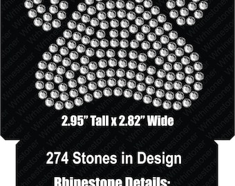 May include: A paw print design made of 274 clear crystal rhinestones, measuring 2.95 inches tall by 2.82 inches wide.