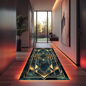 May include: A geometric patterned rug with gold and teal accents. The rug is laid out in a hallway with warm orange lighting.
