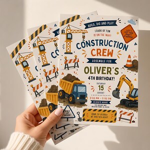 May include: A construction-themed birthday invitation card featuring illustrations of a crane, a dump truck, an excavator, and traffic cones. The text reads: Build, Dig and Play, Construction Crew, Assemble for Oliver's 4th Birthday, Saturday 15 August.
