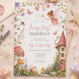 May include: A rectangular birthday invitation card featuring watercolor illustrations of a fairy, a pink cottage, mushrooms, and wildflowers. The text reads: A MAGICAL CELEBRATION fairy first BIRTHDAY, PLEASE JOIN US FOR A BIRTHDAY PARTY TO CELEBRATE ISLA ROSE, SATURDAY, JULY 25 AT 2:00 PM, THE GARDEN PAVILION, 42 MEADOW LANE, BERRY, NSW 2535, RSVP BY JULY 6, TO AMY AT (123) 456-789.