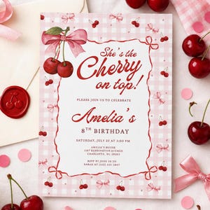 May include: A rectangular birthday invitation card featuring a light pink and white gingham pattern, decorated with red cherry illustrations and pink bows. The text reads: She's the Cherry on top! Please join us to celebrate Amelia's 8th birthday.