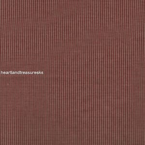 May include: Red and white gingham fabric with a subtle texture. The fabric is measured with a ruler in inches.