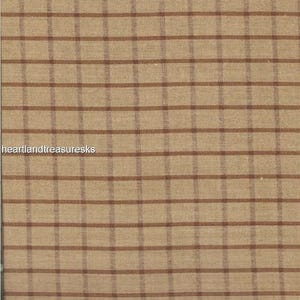 May include: Brown and beige plaid fabric with a subtle texture. The fabric is measured in inches.