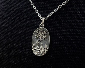 Snowflake and pine trees necklace. Sterling silver pendant and chain.