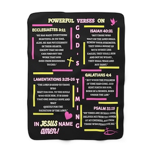 May include: Black blanket featuring Bible verses on God's timing, including Ecclesiastes, Isaiah, Lamentations, Galatians, and Psalm. Text is in white, yellow, and pink, with a cross and fish symbol.