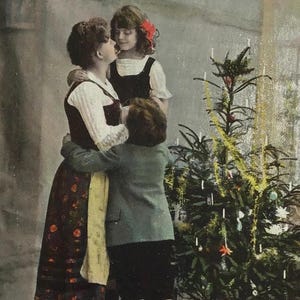 Vintage Christmas Postcard – Mother with Children by Tree, Hand-Tinted Early 1900s