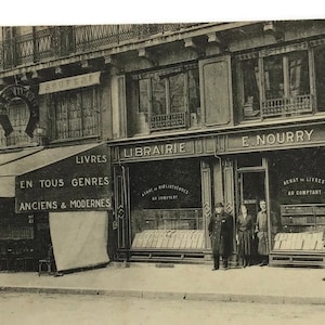 Carte postale vintage de Paris de 1932 – Librairie E. Nourry, rue des Écoles