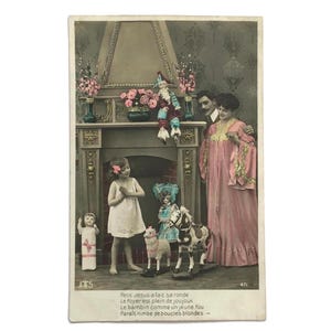 Vintage Franse ansichtkaart met scène speelgoed en familie – belle époque kerstset – handgekleurde foto RPPC