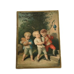 Antique French Trade Card – Boys on Their Way to a Party – Maison A. Adam Advertising (c. 1890s)