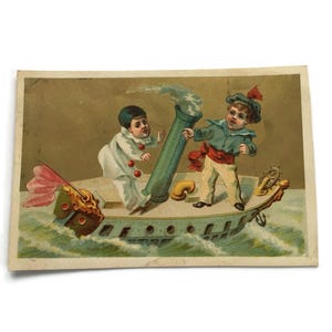 Antique Trade Card – Children on a Steamship – Pierrot & Sailor Scene