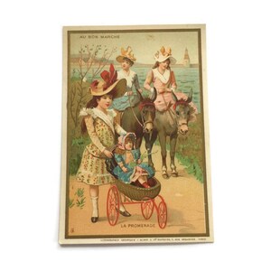 Antica cartolina commerciale francese – Bambini con asini e carrozzina in riva al mare (Au Bon Marché)