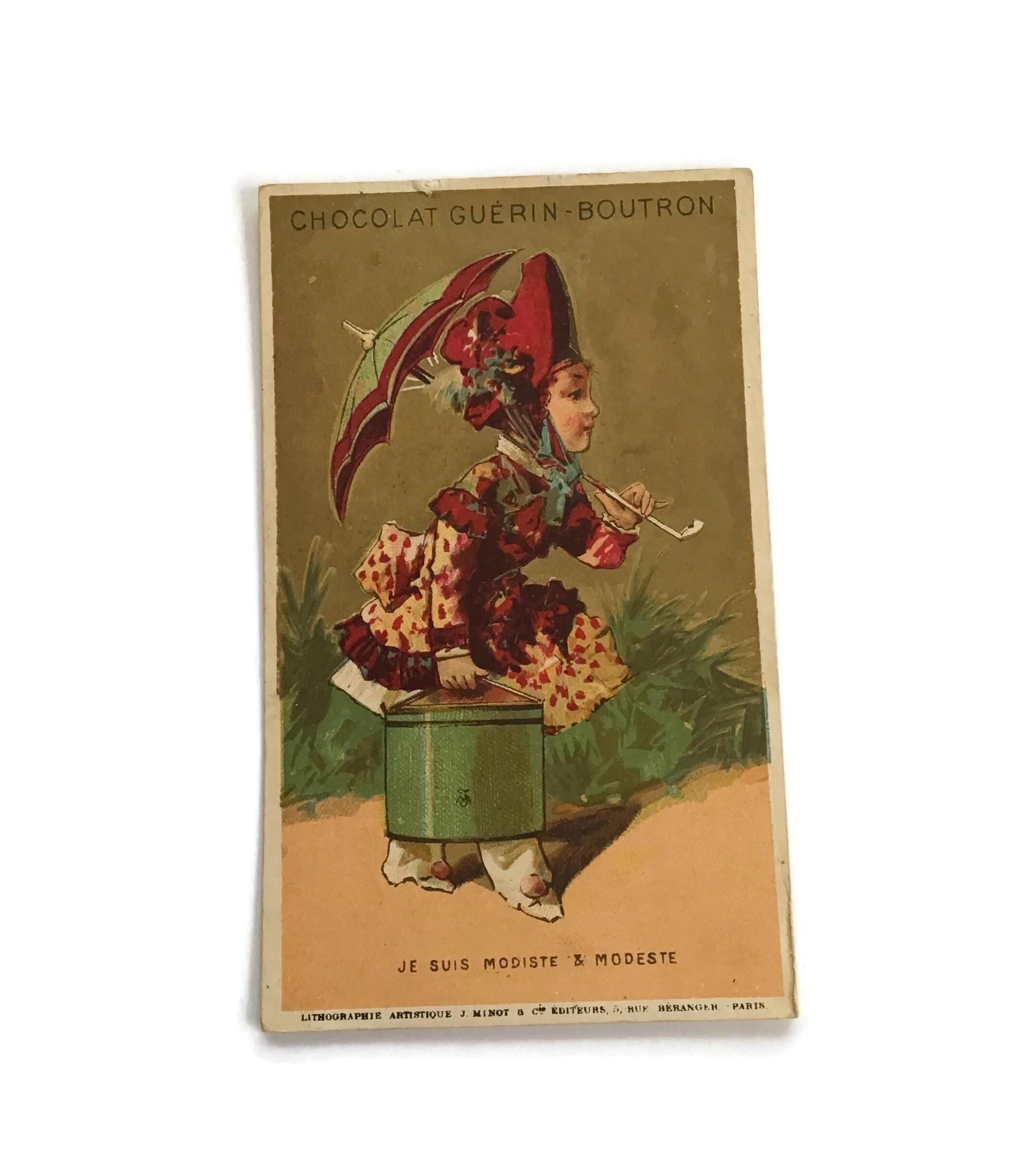 Antique French Trade Card – Modiste Scene with Parasol and Hat Box
