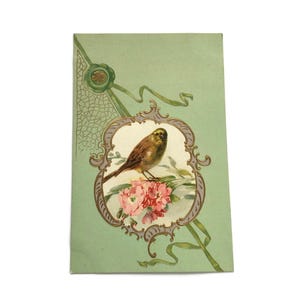 Postal antigua en relieve: Pájaro cantor y flores rosas, Art Nouveau francés, principios del siglo XX, sin usar.