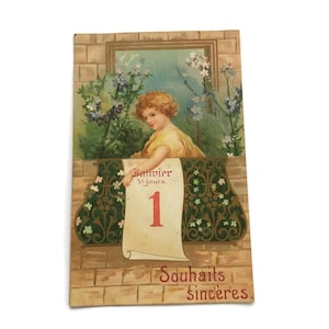 Carte postale française ancienne – Fille du Nouvel An du 1er janvier avec des fleurs,