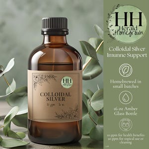May include: A brown glass bottle of colloidal silver with a black cap. The label states "Colloidal Silver" and "10 ppm 473 ml." The bottle is from the "Herald Homegrown" brand and is for immune support.