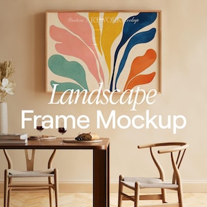 May include: A framed abstract landscape painting with colorful swirls in shades of pink, yellow, blue, green, and orange. The painting is hanging on a beige wall above a wooden dining table with two chairs.