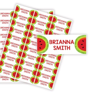 May include: A sheet of white labels with a watermelon design and the name "Brianna Smith" printed on each label.